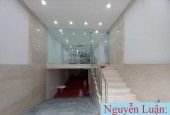 Tòa nhà văn phòng MP Nguyễn Ngọc Nại 100m x 9 tầng MT 5.5m nhà đẹp thang máy chỉ 34.6 tỷ